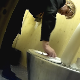 A blonde, mature Eastern-European woman takes a piss while sitting on a steel public toilet. No pooping. Presented in 720P HD. Over 3 minutes.
